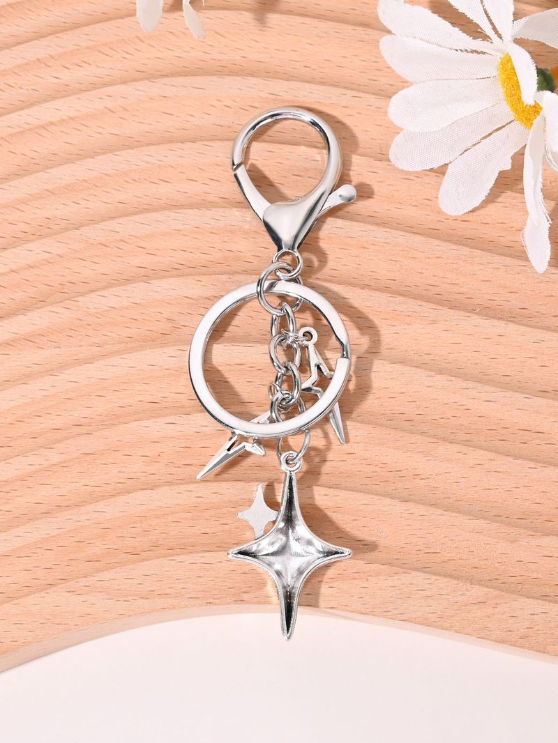 Colgante de llavero para coche con forma de estrella de cuatro puntas, estilo coreano, sencillo, ideal como regalo de San Valentín._voghion.com