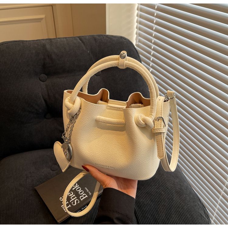 Personalized Solid Color Folding Drawstring Beaded Bow Shoulder Crossbody Bag_voghion.com