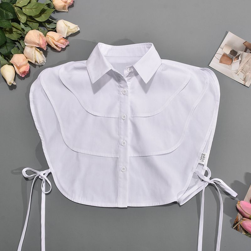 Camicia da donna con lacci senza maniche e cuciture a vista sull'ombelico_voghion.com