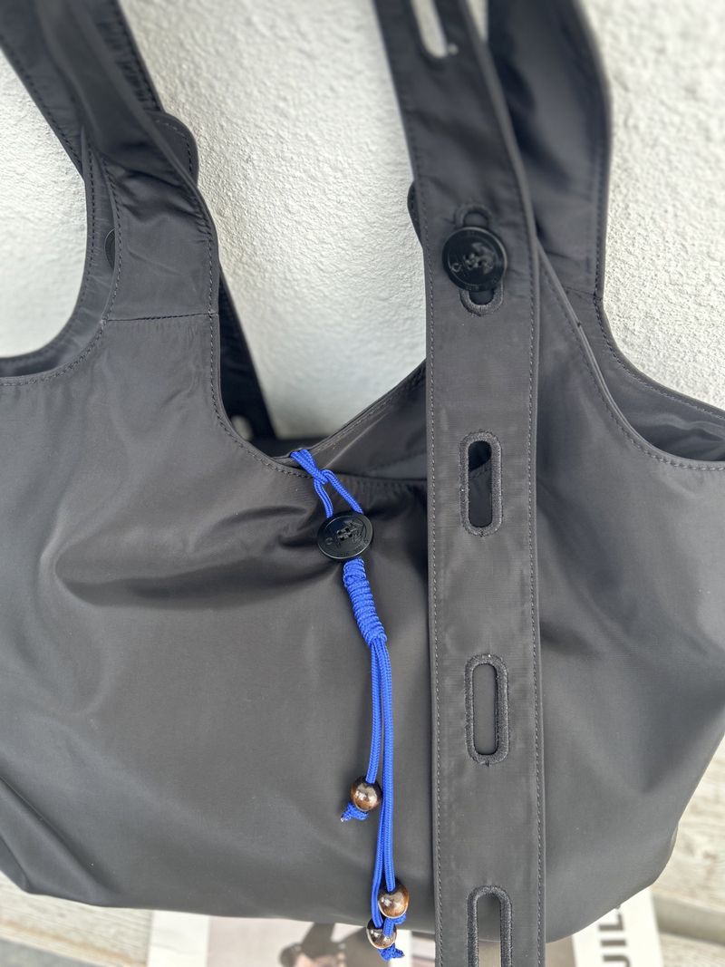 Borsa tote portatile per esterni, borsa intrecciata, fibbia in corda, semplice, impermeabile, comoda per lo shopping, nuova moda autunno e inverno 2025, versatile, quotidiana_voghion.com