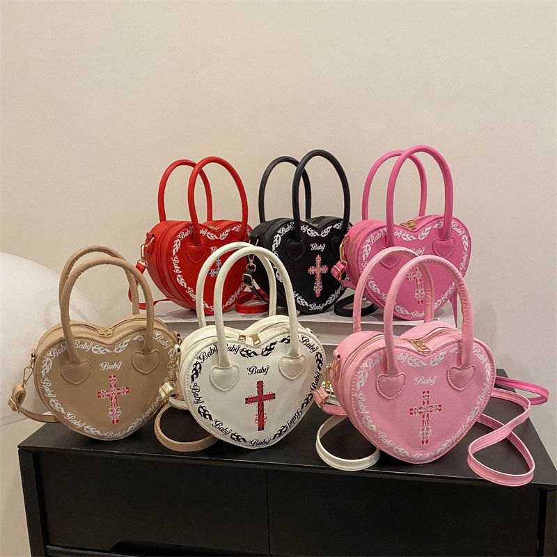 Borsa da donna personalizzata Rivet Punk Dark 2024 Nuova borsa a forma di cuore, borsa a tracolla incrociata, borsa a tracolla per donna_voghion.com