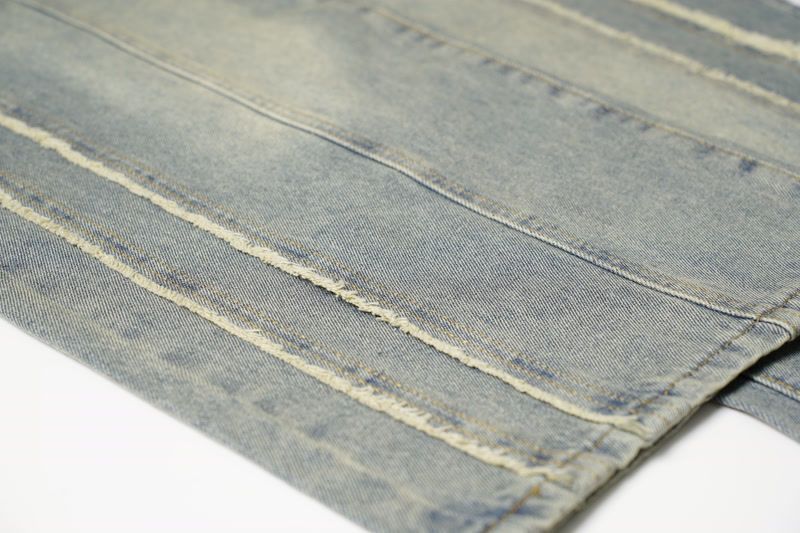 Muška odjeća Modni brend Krojenje Raw Edge Bar Design Isprane stare rupe Izlizane bijele široke nogavice High Street trend muške traperice_voghion.com