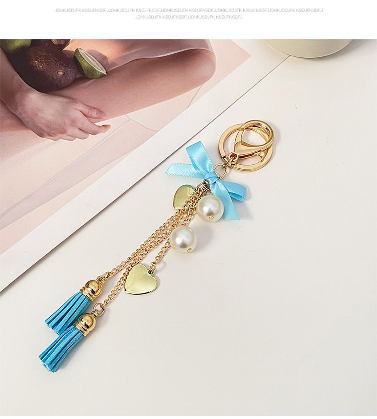 Neue exquisite Bowknot Quaste Herz Auto Schlüsselanhänger Telefon Fall Tasche Anhänger kleine Geschenk Dekoration_voghion.com