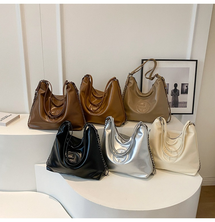 2024 Light Luxury Creative Women's New Cool And Trendy Saddle Bag Fashion Large Capacity Shoulder Bag Solid Color Handbag_voghion.com