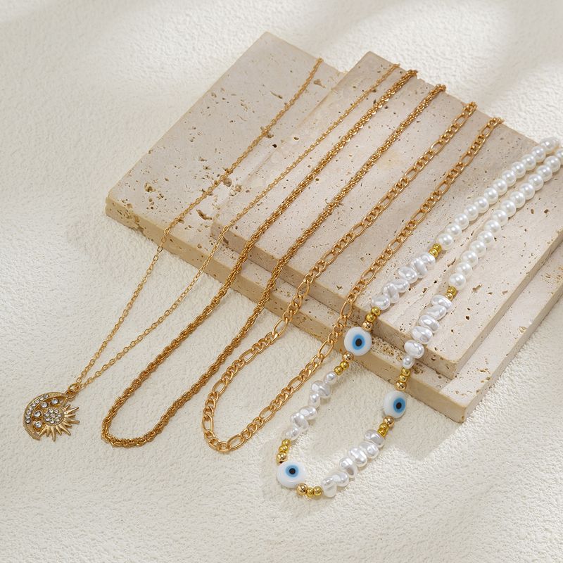 Gioielli transfrontalieri europei e americani, collana di perle di forma speciale in stile etnico, catena a clavicola in lega retrò con ciondolo a forma di occhio di sole_voghion.com