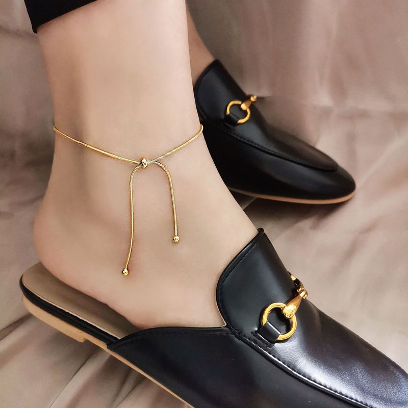 Bohemian Ethnic Snake Bone Pull Foot Chain Female Titanium Steel Non-fading Light Luxury Niche Design Bare Chain Adjustable High-end Foot Decoration_voghion.com