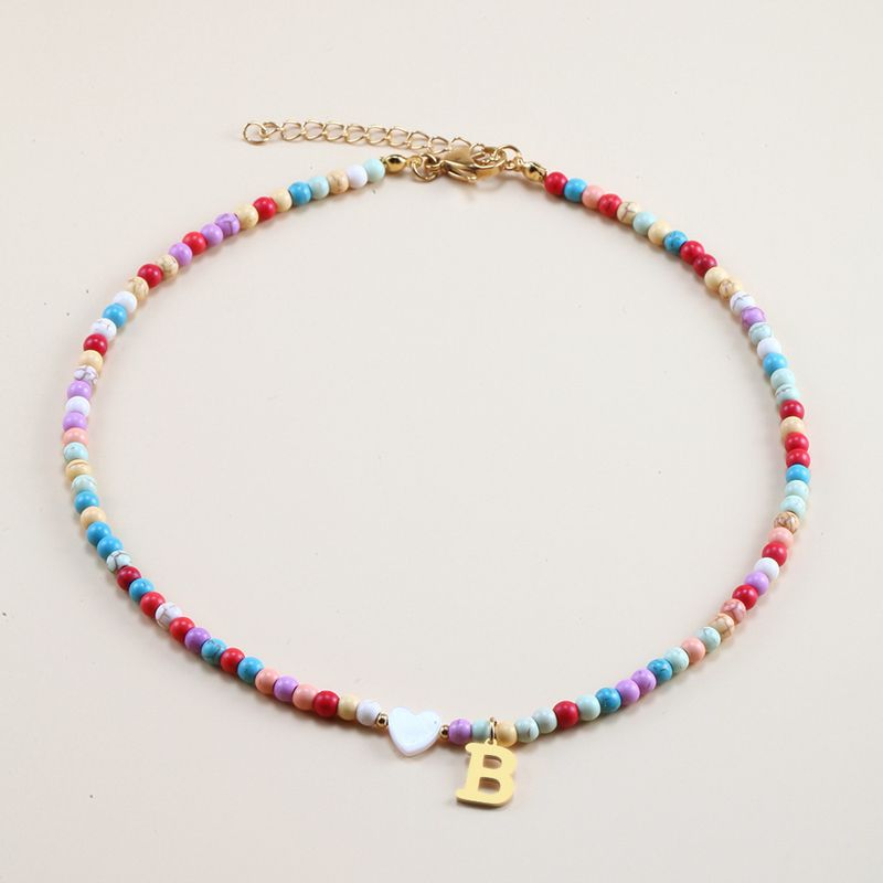 Vendita calda transfrontaliera in acciaio inossidabile oro 26 lettera inglese ciondolo conchiglia amore colore misto turchese collana fai da te clavicola_voghion.com