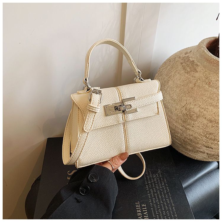 2025 neue einfache Retro-Damentasche Mode lässig Handheld Crossbody kleine quadratische Tasche Pendlertasche_voghion.com