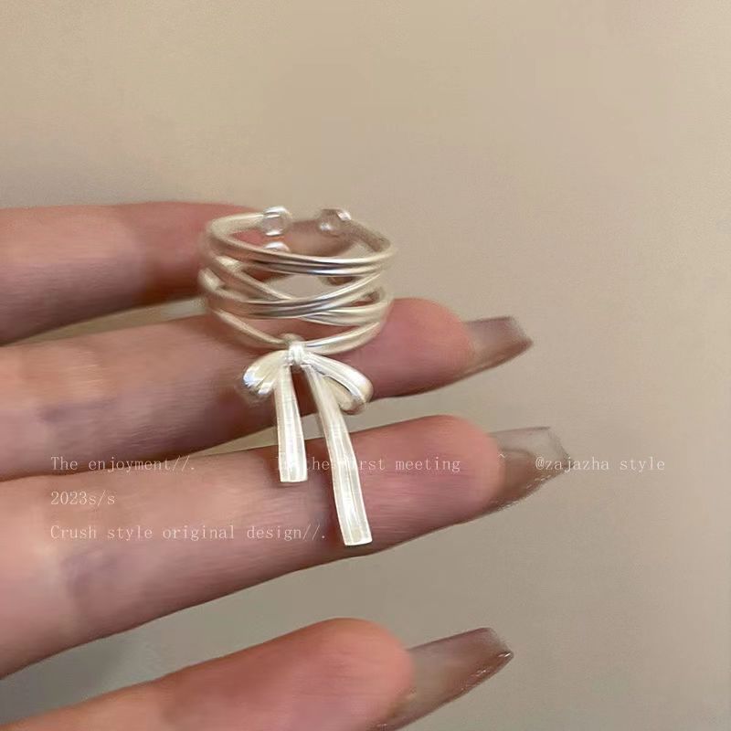 Kall distanserad fransk rosett och bandöppning, kvinnlig nischdesign med avancerad justerbar pekfingerring, unik_voghion.com