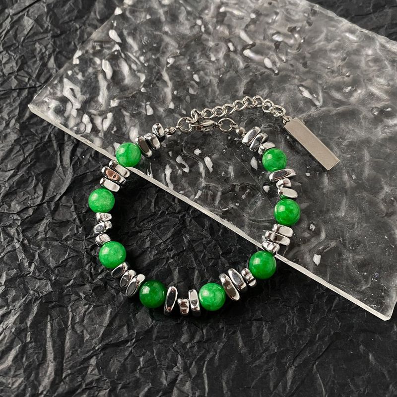 Den senaste omgången av designade kattögonstensarmband skarvade med INS trendiga handtillbehör titanstål obsidian herr- och damarmband_voghion.com