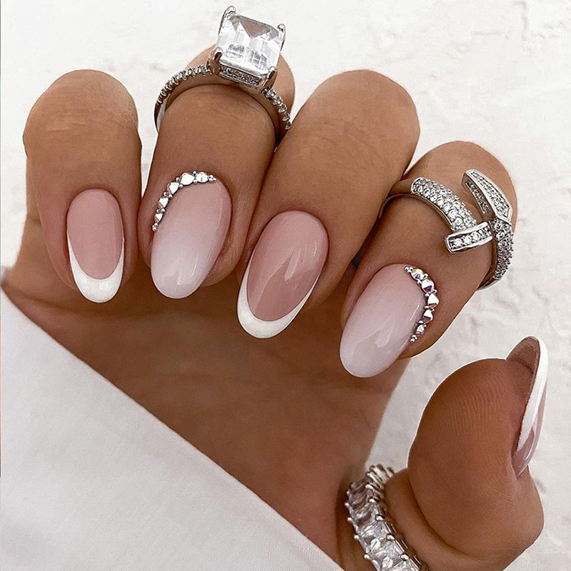 24 pezzi semplici unghie finte a mandorla bianco lucido stiletto francese unghie finte ovale staccabile copertura completa stampa su na_voghion.com