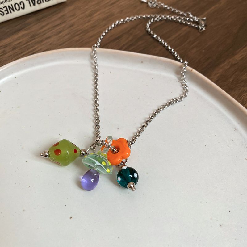 Lampadario a sospensione in acciaio e vetro con fiore a forma di fungo, di lusso, design di nicchia, collana, temperamento alla moda, accessorio,_voghion.com