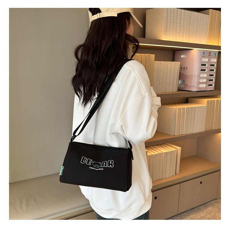 2024 New Casual Shoulder Women's Oxford Cloth Large Capacity Lightweight Pillow Black Minimalist Printed Crossbody Bag_voghion.com