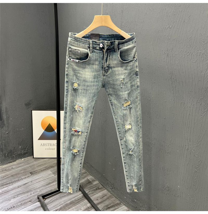 Abbigliamento maschile Marchio di moda mendicante jeans strappati uomo primavera ed estate pantaloni attillati skinny elastici giovani bei pantaloni a nove punte_voghion.com