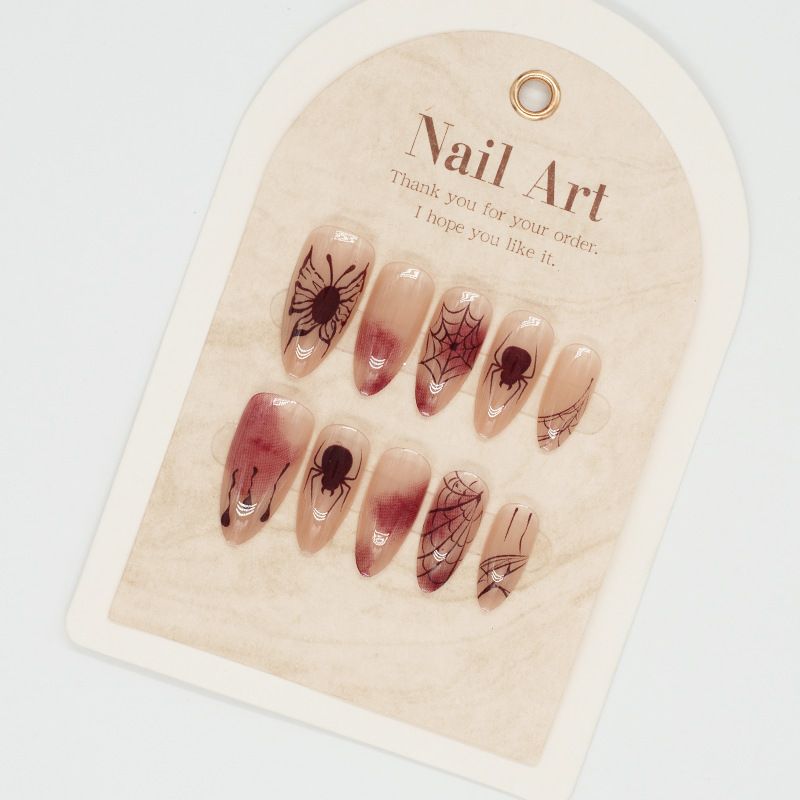 Ragnatele macchiate di sangue che indossano armature, farfalle, toppe per nail art di Halloween_voghion.com