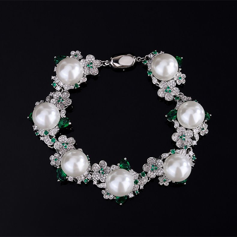 Braccialetto di perle di Tahiti d'acqua dolce con conchiglia grigia e fiore del palazzo austriaco_voghion.com