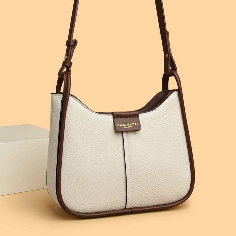 La borsa a tracolla monospalla di tendenza di quest'anno per le donne, in vera pelle, dal design di nicchia, di alta qualità, per i pendolari._voghion.com