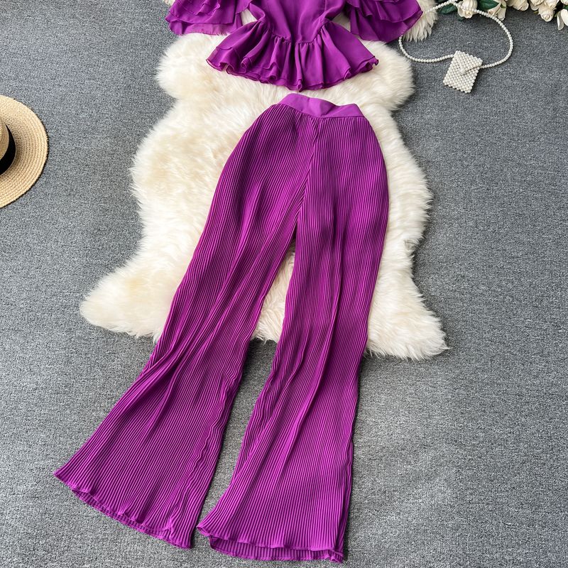 Vêtements pour femmes Costume de vacances pour femmes 2023 nouvelle chemise en mousseline de soie à bretelles à épaules dénudées à volants et pantalon large plissé drapé_voghion.com