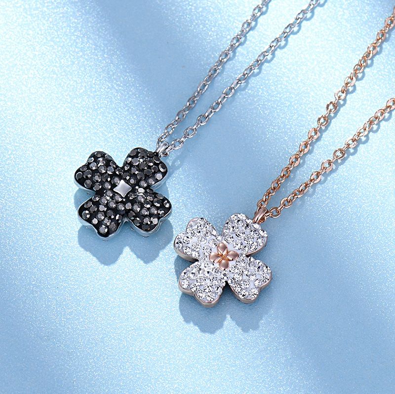 Colar de trevo de quatro folhas com dupla face para mulheres, preto e branco, joia de metal galvanizada, versão dourada e prateada_voghion.com