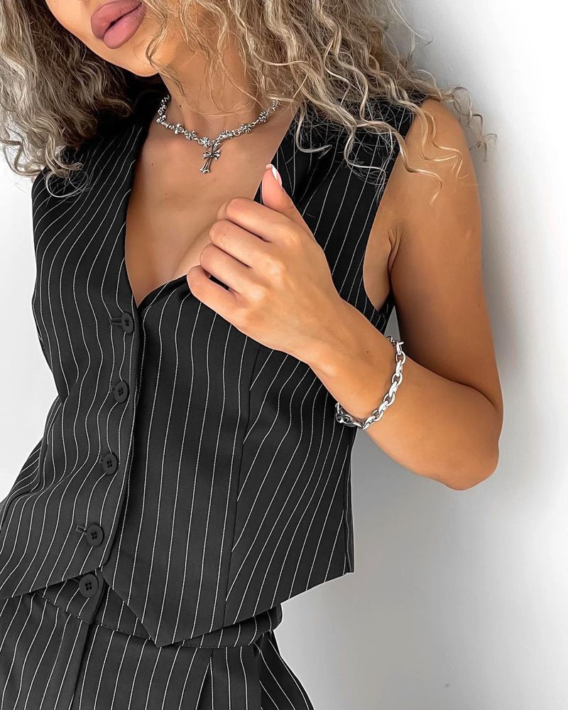 Sexy Temperament breiter Schultergurt V-Ausschnitt ärmellose Weste mittlere Taille schmale Hose mit weitem Bein zweiteiliger Freizeitanzug_voghion.com