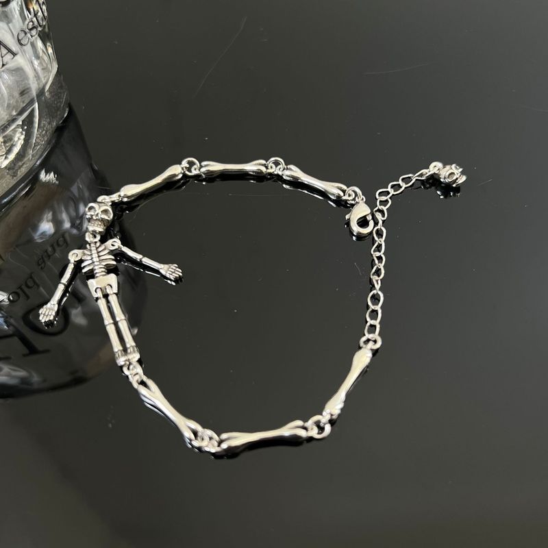 Bracciale INS con teschio per uomo e donna, stile hip-hop di tendenza, gioielli in osso unici, orecchini color oro_voghion.com