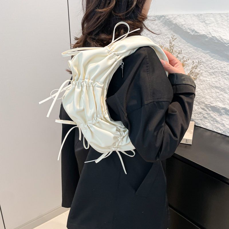 Einzelne Schulter Unterarm High-End-Handtasche Leichte Nischendesign Persönlichkeit Frauen Halbmond Unregelmäßige Abendtasche_voghion.com