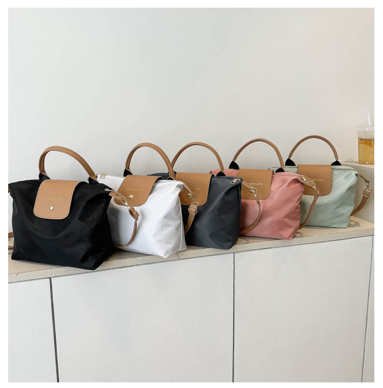La popolare borsa a tracolla Oxford piccola da donna 2023 di quest'anno, nuova e trendy, in colori a contrasto, casual_voghion.com