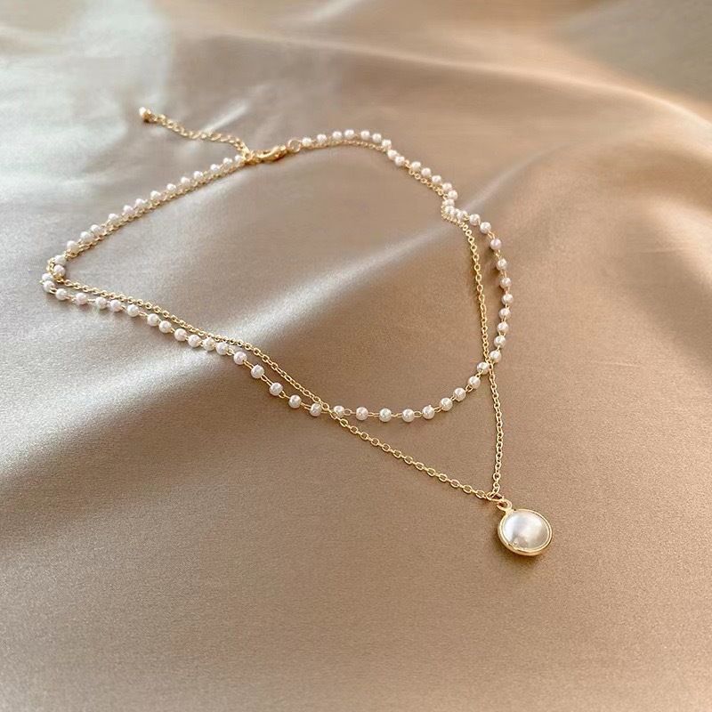 Collana di lusso leggera con design di nicchia coreano per donne, stile Ins, combinazione di perle, catena versatile per clavicola alla moda_voghion.com