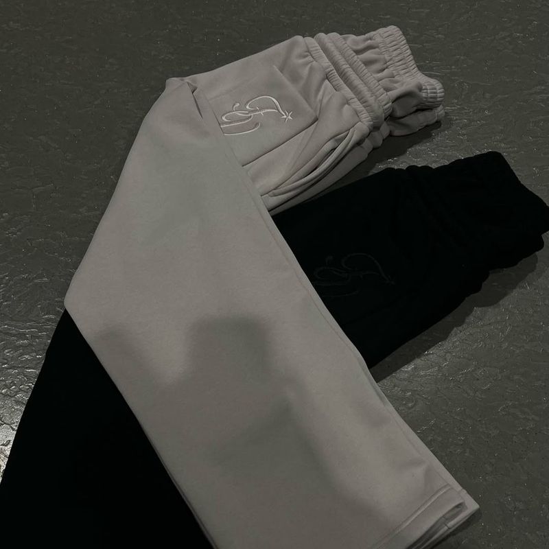 Calças de moletom de cintura alta da moda masculina e feminina - Calças de moletom largas com ajuste solto e cordão, estilo europeu e americano_voghion.com