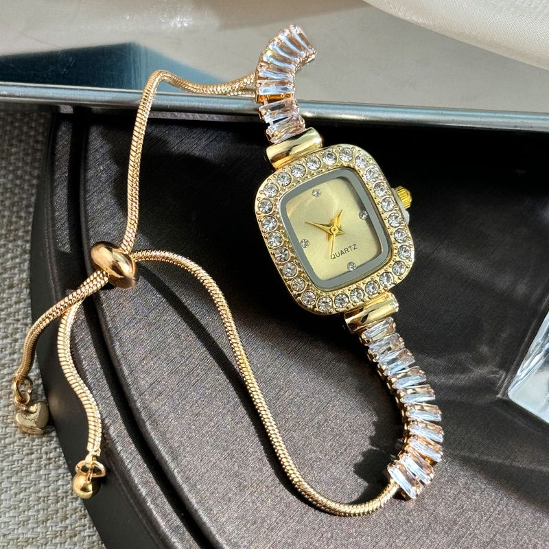 Damenarmbanduhren Zirkon Kleine Zuckerwürfel-Armbanduhr Ausziehbare Lazy Watch Außenhandel Grenzüberschreitende farbige Diamant-Damenquarzuhr_voghion.com
