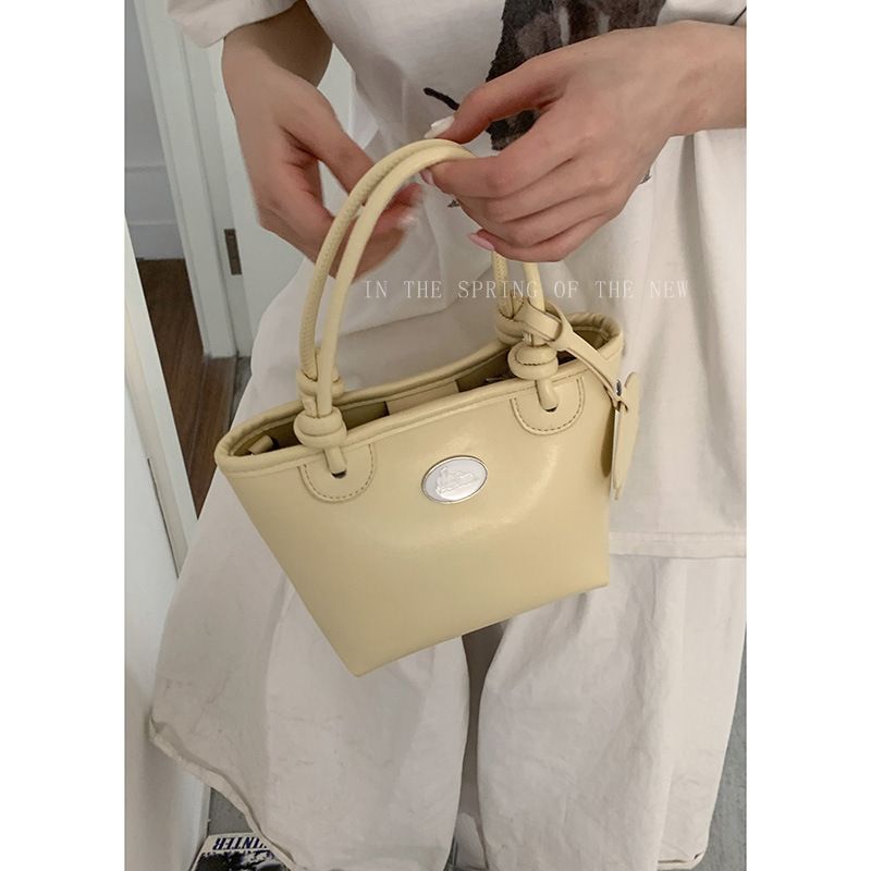 Borsa a tracolla versatile con tracolla a secchiello, stile estivo, per donna, 2025_voghion.com