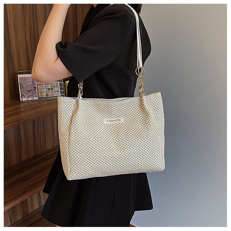 Tote Women's Large Capacity 2024 New Spring/Summer Grass Weaving Shoulder Bag with Advanced Sense for Work and Commuting_voghion.com