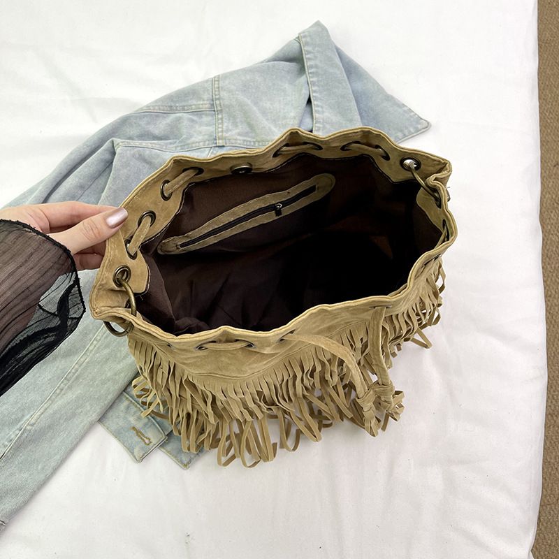 Borsa a tracolla da donna con tracolla a secchiello con coulisse e nappa, nuova e semplice, 2025_voghion.com