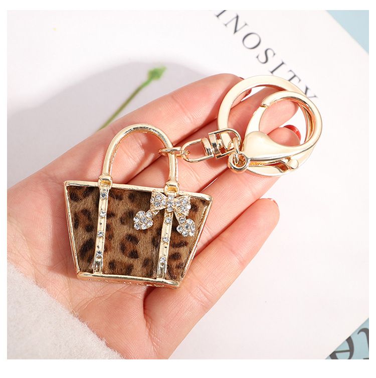 Portachiavi creativo a forma di borsa con stampa leopardata, ciondolo per auto squisito, piccolo regalo._voghion.com