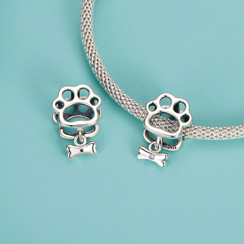 Dije de plata de ley con forma de pata de perro hueca, SCC2955_voghion.com