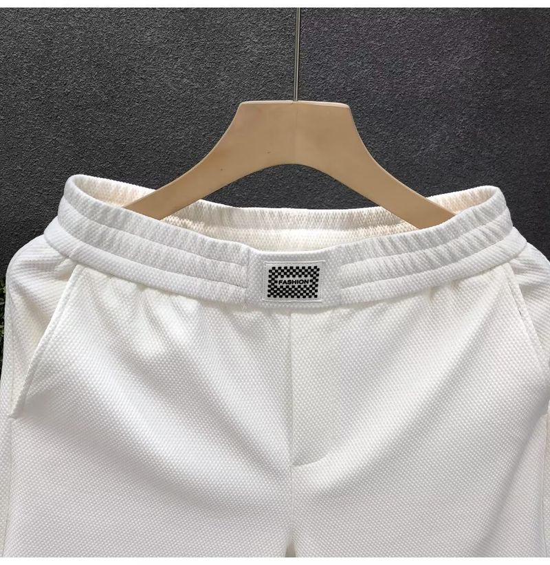 Pantalones cortos blancos ligeros de lujo para hombre, ropa de abrigo de verano, pantalones cortos deportivos casuales de longitud media para hombre._voghion.com