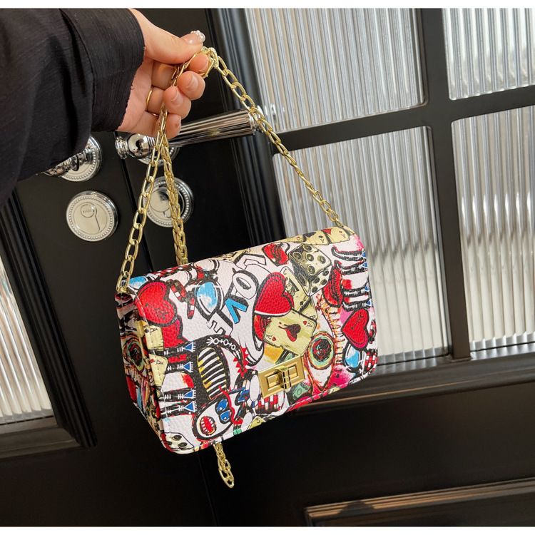 New trendy women's with Korean print style graffiti small square bag, buckle chain, single shoulder diagonal cross bag_voghion.com