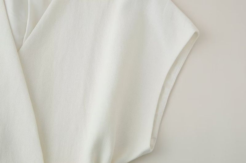 Abbigliamento da donna alla moda e versatile, gilet doppiopetto in misto lino con pantaloni a pieghe_voghion.com