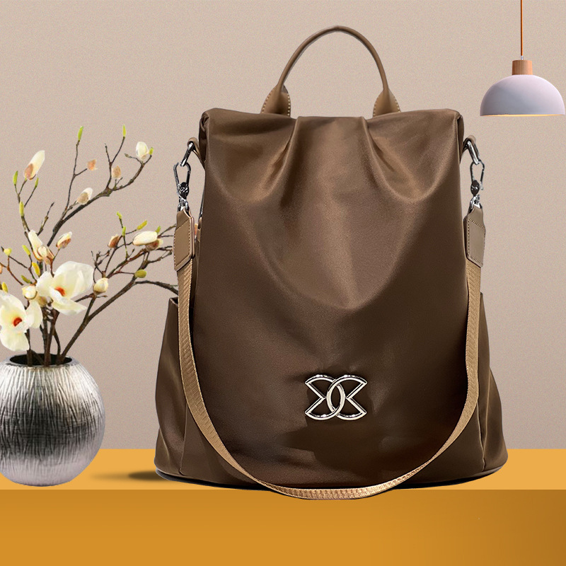 Mochila para mulheres, mochila de viagem, mochila de deslocamento para mulheres, mochila de tecido Oxford versão coreana_voghion.com