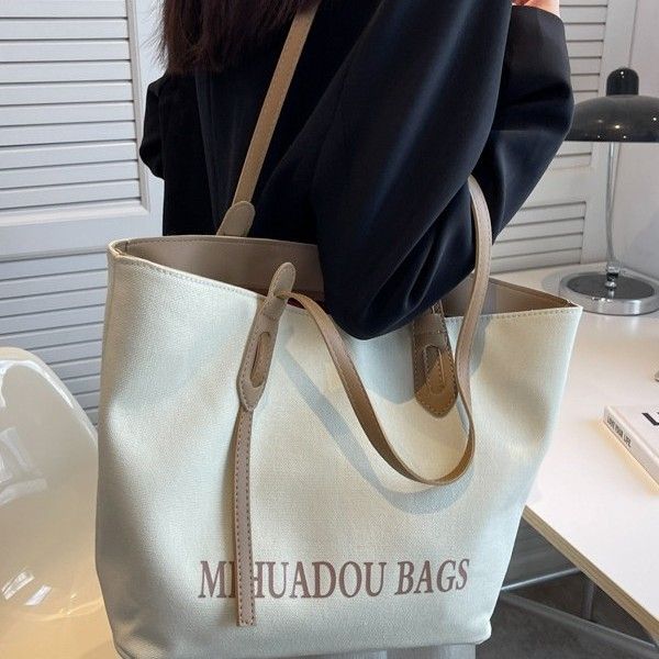 Canvas Large Women 2025 Spring New High-end Fabric Handheld Shoulder Bag For Class And Commute Tote_voghion.com
