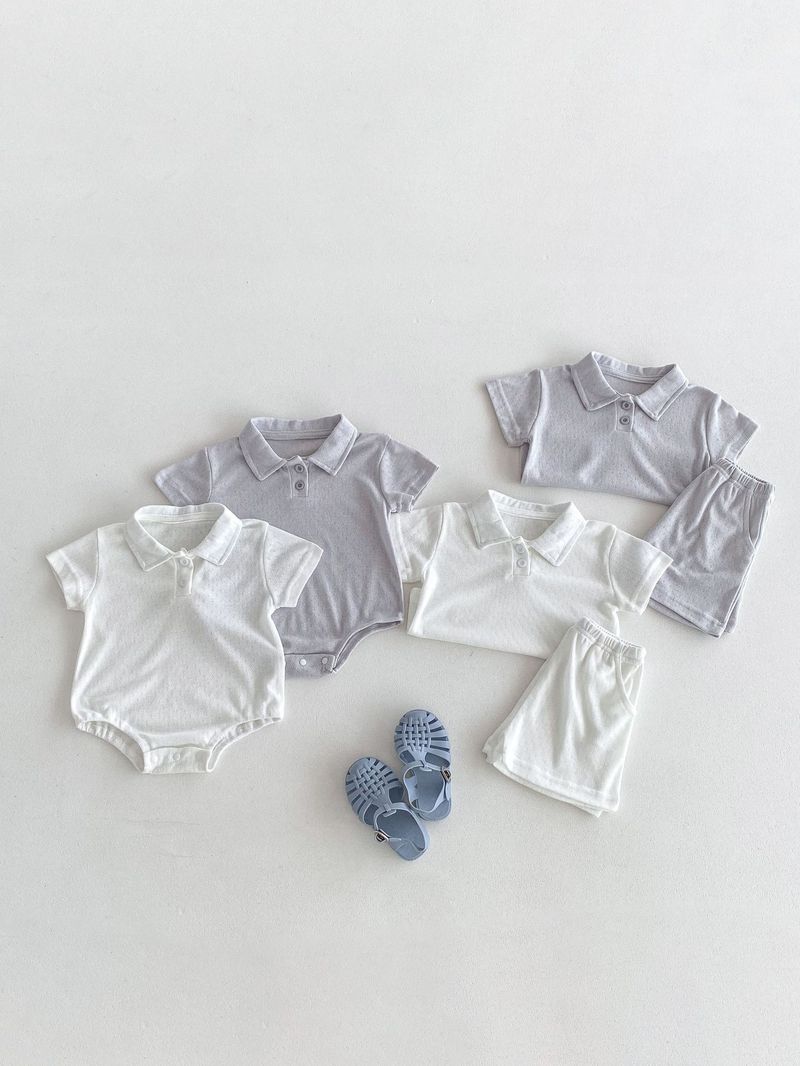 I pantaloncini a maniche corte per neonati e bambini per mamma e bambino si adattano a vestiti striscianti a triangolo cavo semplici e comodi per uscire_voghion.com