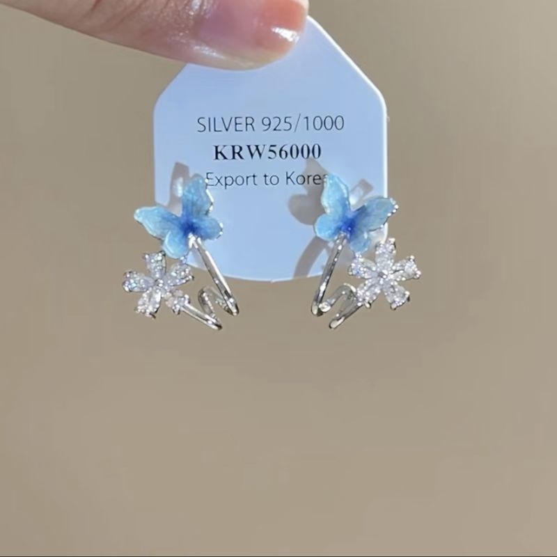 Orecchini versatili di alta moda di lusso con nappa di cristallo e fiore di diamanti intarsiati con ago d'argento_voghion.com