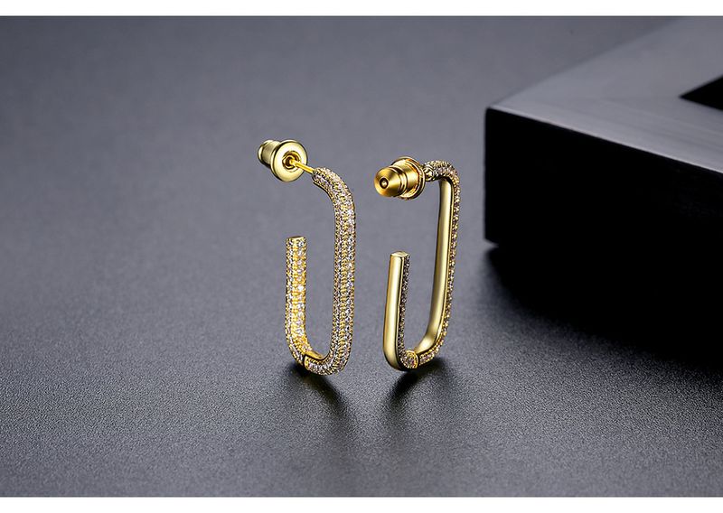 Orecchini a bottone da donna con zirconi cubici e design interamente in diamanti, clip per orecchini a forma di U placcate in oro 18 carati per un look elegante e alla moda._voghion.com