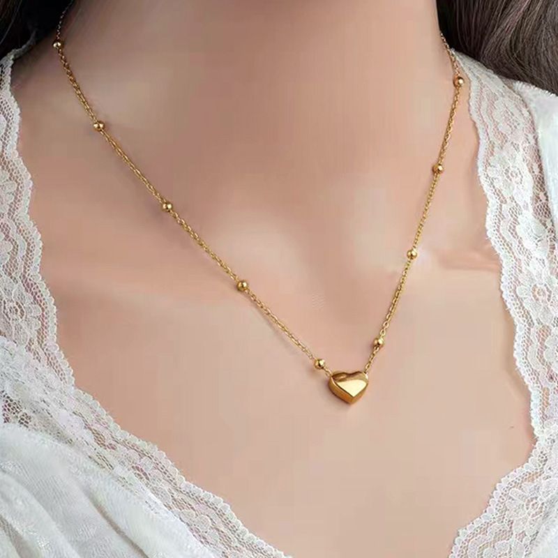 Collana da donna con ciondolo dorato, collana alla moda, nuova collana in acciaio al titanio con ciondolo a cuore, per donna, versatile catena per clavicola in oro resistente allo sbiadimento_voghion.com