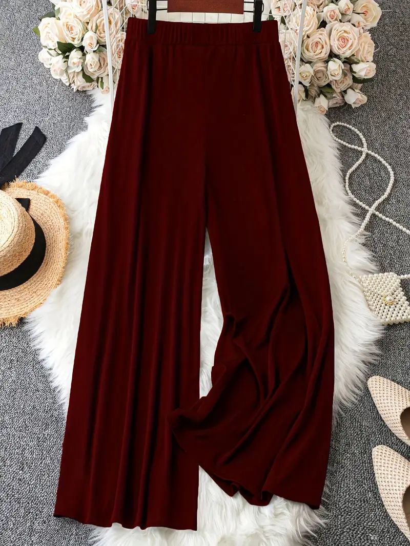 Calças largas casuais de botão de cor sólida elegantes de primavera e verão 2025_voghion.com
