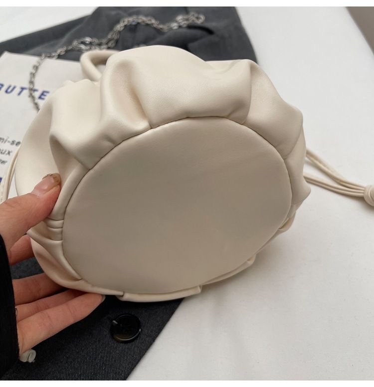 Korean high-end soft glutinous cloud bucket bag, niche pleated handbag, cute ins shoulder crossbody bag_voghion.com