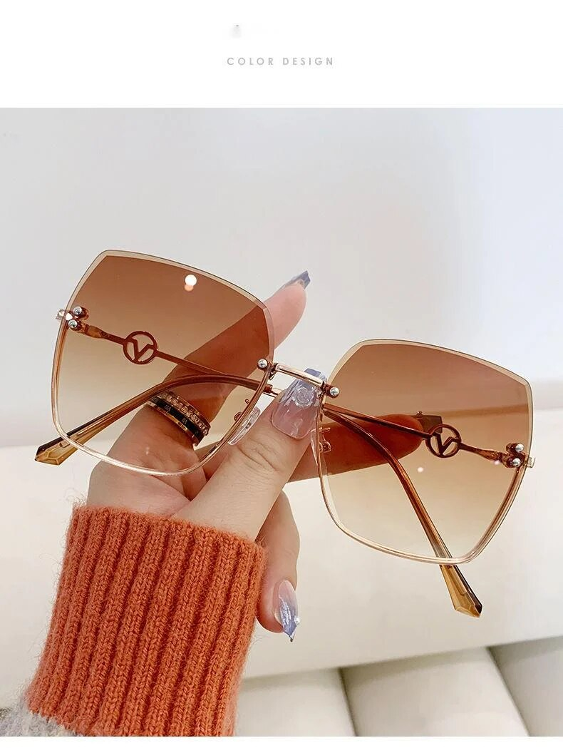 Neie Frameless Cut Edge Women's Fashion Metal Large Frame Gradient Liicht Sonnebrëller fir Fuere Sonnevisiren Ins_voghion.com