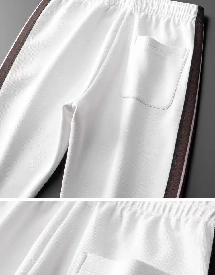 Meeste rõivad kaubad kerge luksus 2024 kevad ja suvine moesuund kontrasti värvi lint õhuke meeste sirge sport dressipüksid vabaaja püksid mehed_voghion.com