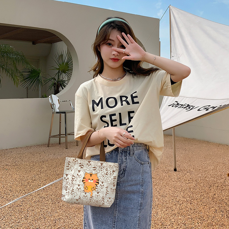 Canvas women's new 2024 handbag, bento bag, student office workers carrying and accompanying gifts_voghion.com