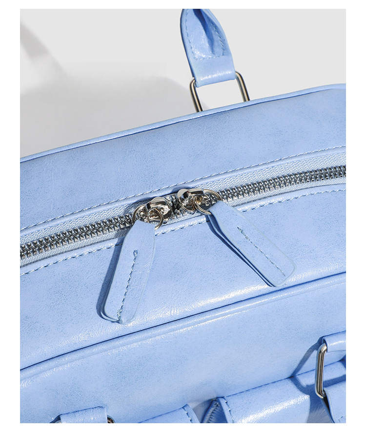 Versione coreana dei modelli estivi Ms. 2025 della nuova borsa a tracolla grande e capiente in pelle cerata con olio sotto le ascelle, alla moda e versatile._voghion.com